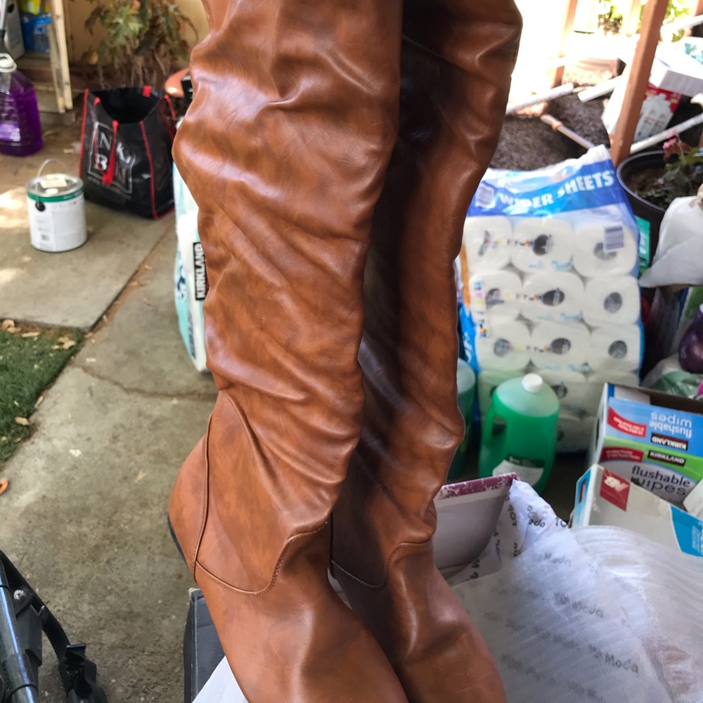 Brown knee high boots